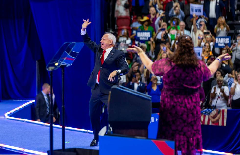 Minnesota Gov. Tim Walz, arrives on stage during a campaign rally at UNLV’s Thomas & ...