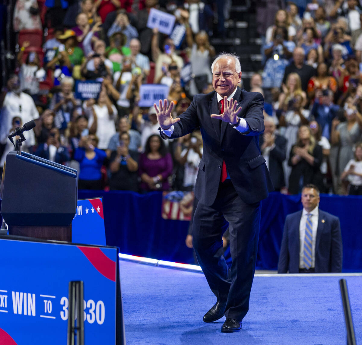 Minnesota Gov. Tim Walz, greets supporters on stage during a campaign rally at UNLV’s Th ...