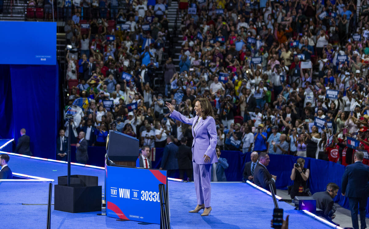 Vice President Kamala Harris greets supporters as she takes the stage during a campaign rally a ...