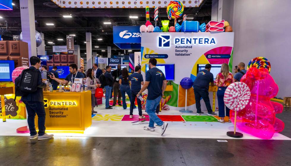 The Pentera display is set in the like of Candyland as attendees wander about during the Black ...