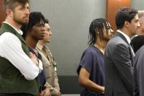 Dontral Beaver, second left, and Treavion Randolph, second right, appear in court during a pret ...