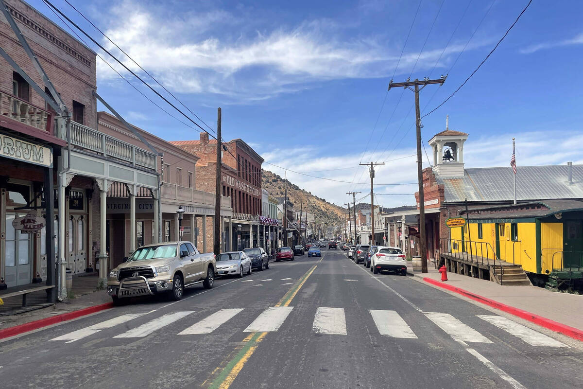 FILE - Cars line the main stretch of Virginia City, Nev., that attracts tens of thousands of to ...