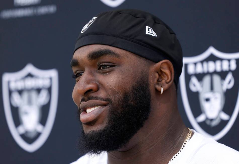 Raiders rookie defensive tackle DJ Glaze addresses the media after rookies first day of practic ...