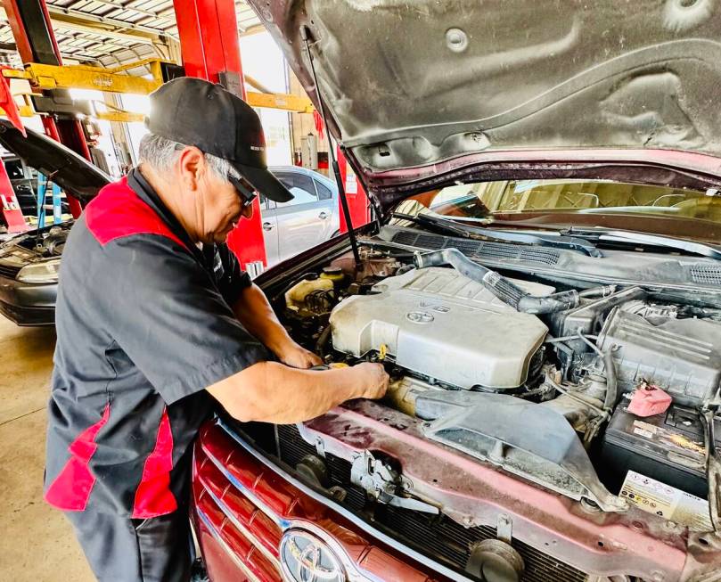 Big O Tires offers services including checking fluids as shown by Pedro Miranda.