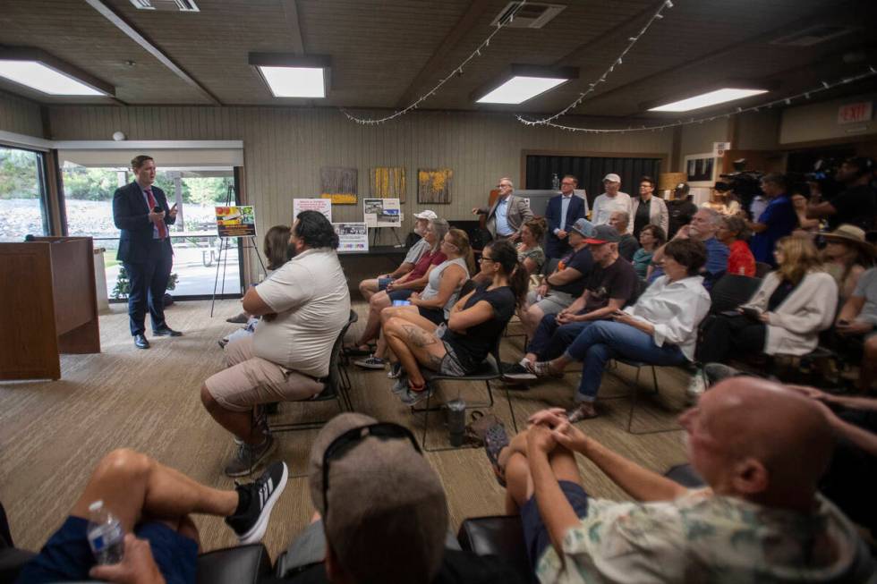 Assistant Superintendent, Construction and Development Division Brandon McLaughlin speaks in fr ...