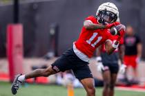 UNLV wide receiver Ricky White III (11) secures a catch during the first day of football practi ...