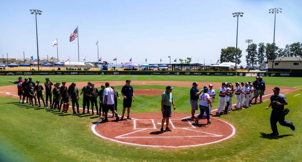 Nevada and Utah are introduced before the Mountain Regional final baseball game on Friday, Aug. ...