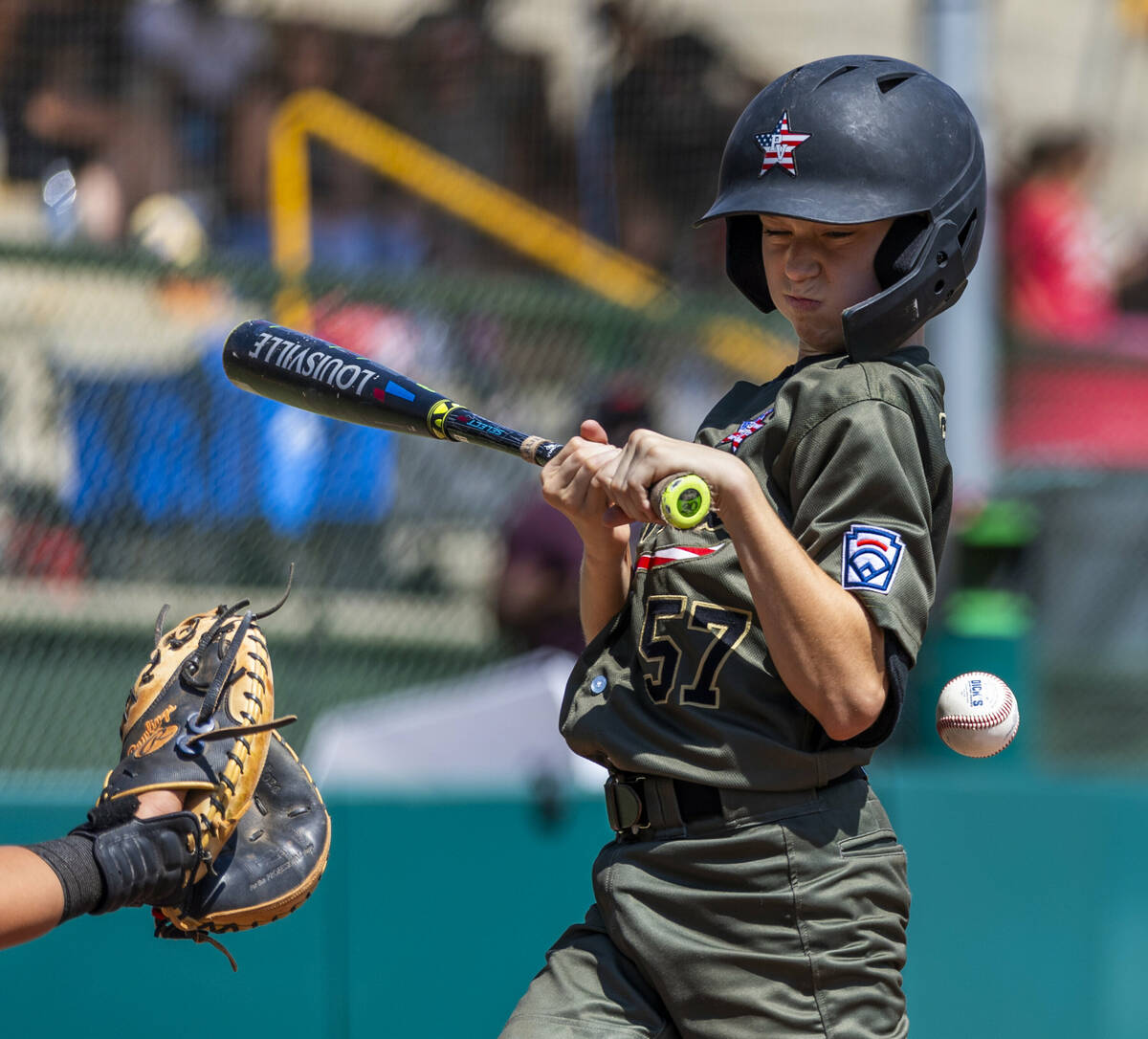 Nevada extra hitter Gunnar Gaudin (57) is hit by a pitch by Utah during the second inning of th ...