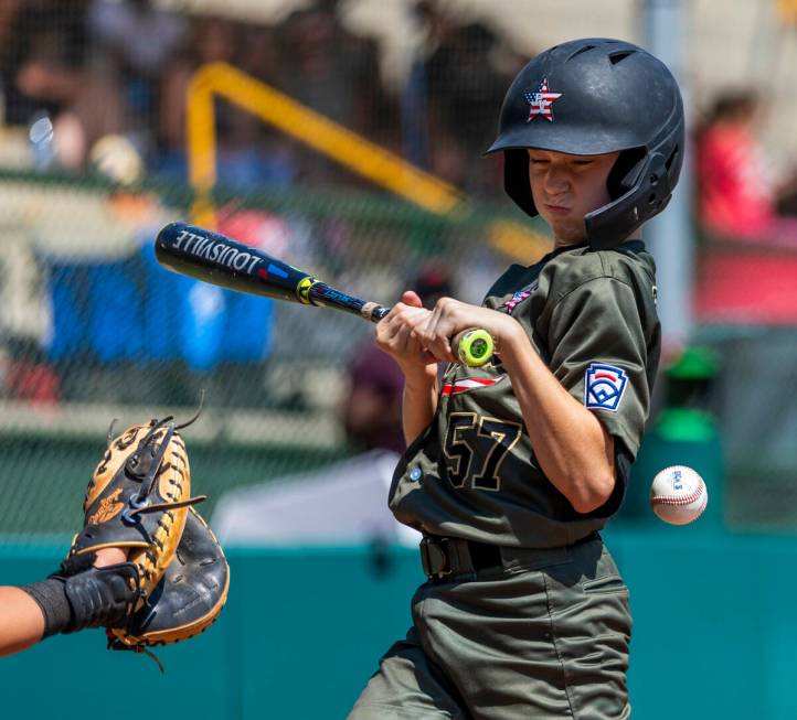 Nevada extra hitter Gunnar Gaudin (57) is hit by a pitch by Utah during the second inning of th ...