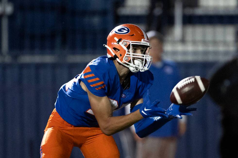 Bishop Gorman wide receiver Derek Meadows (30) catches the ball before running in a touchdown d ...