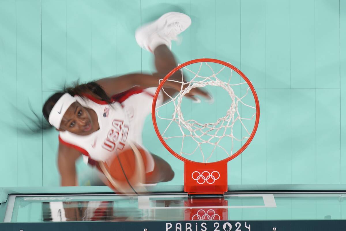 United States' Jackie Young (13) makes a shot during a women's semifinal basketball game agains ...