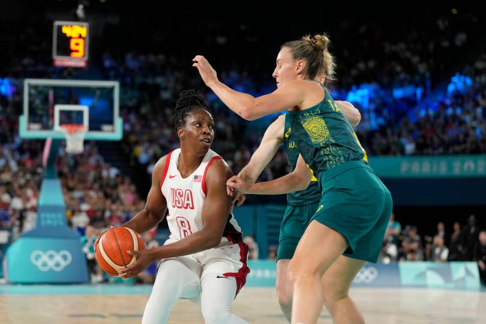 United States' Chelsea Gray (8) drives past Steph Talbot (6), of Australia, during a women's se ...