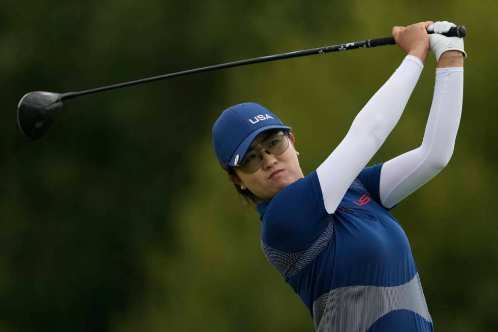 Rose Zhang, of the United States, hits her shot from the 14th tee during the third round of the ...