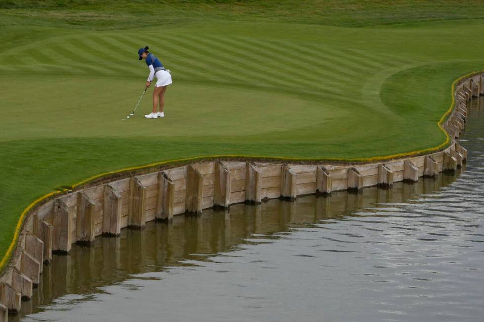 Rose Zhang, of the United States, putts on the 1st green during the third round of the women's ...