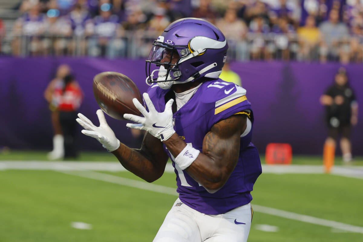 Minnesota Vikings wide receiver Trent Sherfield Sr. (11) pulls in a pass for a touchdown agains ...