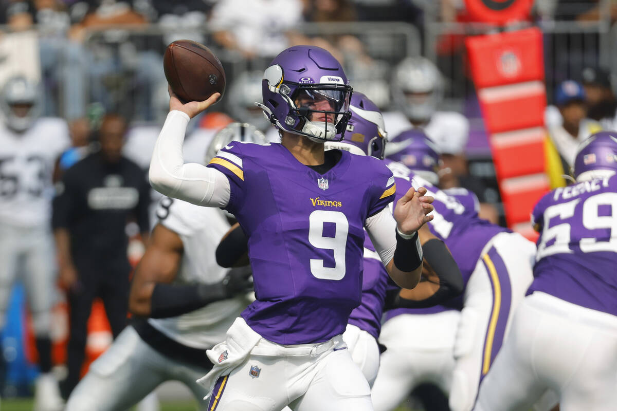 Minnesota Vikings quarterback J.J. McCarthy (9) throws against the Las Vegas Raiders during the ...