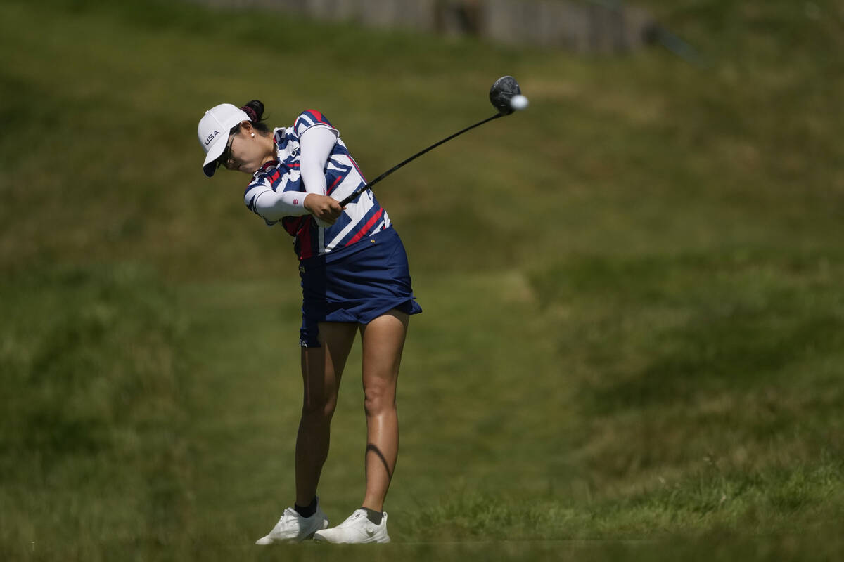 Rose Zhang, of the United States, hits her shot from the 3rd tee during the final round of the ...