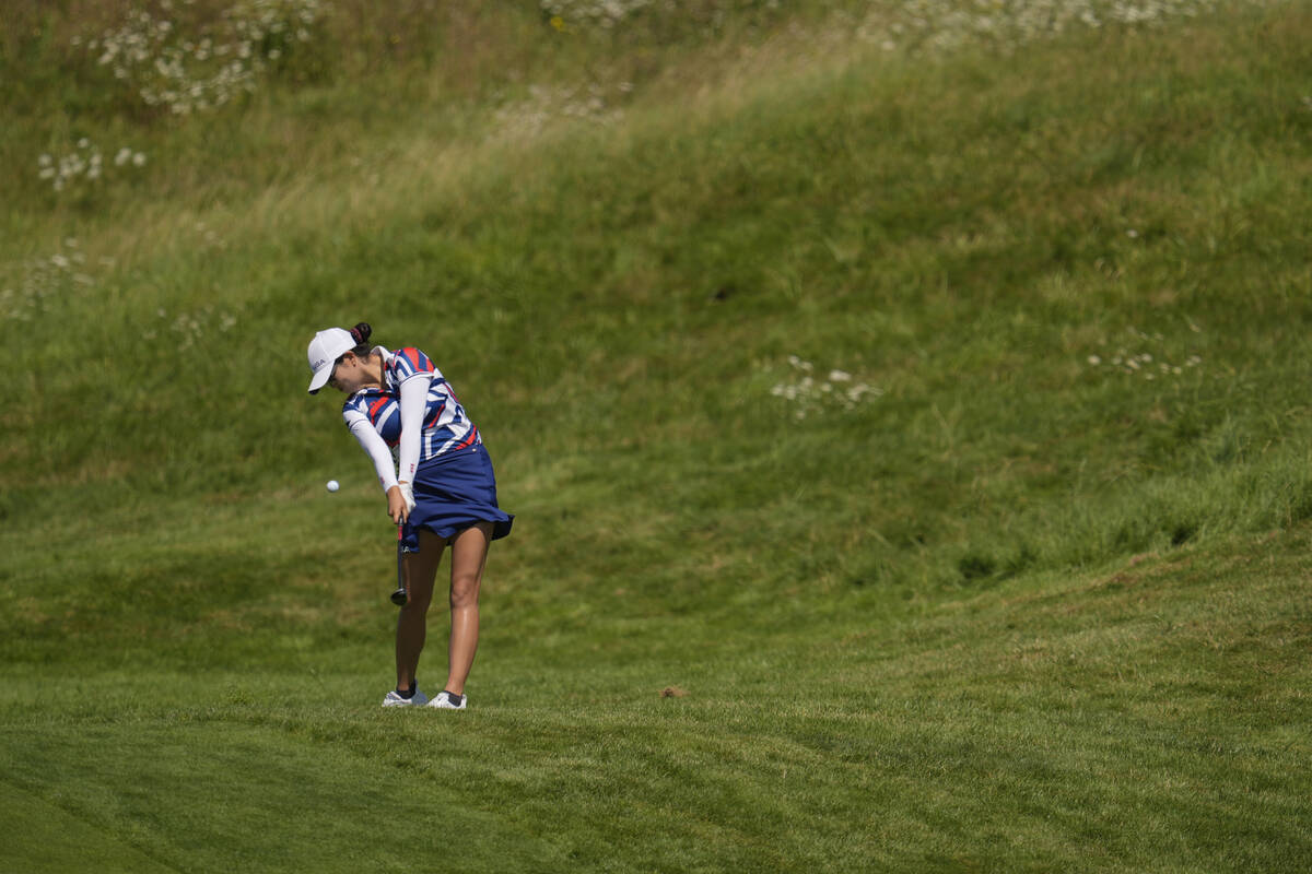 Rose Zhang, of the United States, plays a shot from the 3rd fairway during the final round of t ...