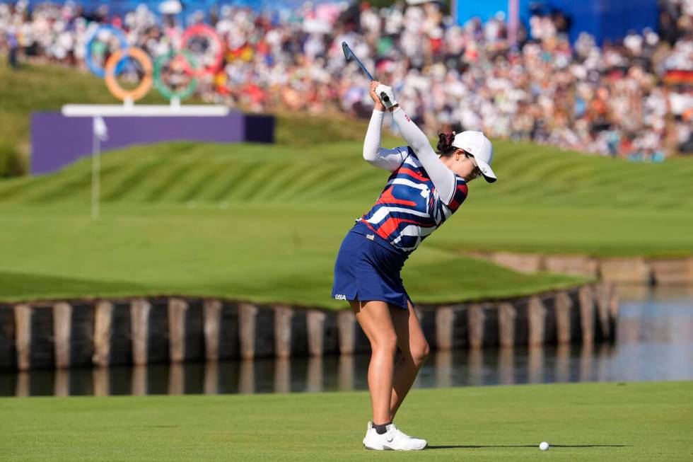 Rose Zhang, of the United States, hits her shot from the 15th tee during the final round of the ...