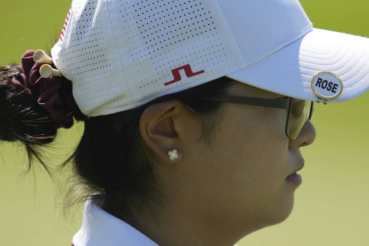 Rose Zhang, of the United States, walks to the 3rd tee during the final round of the women's go ...