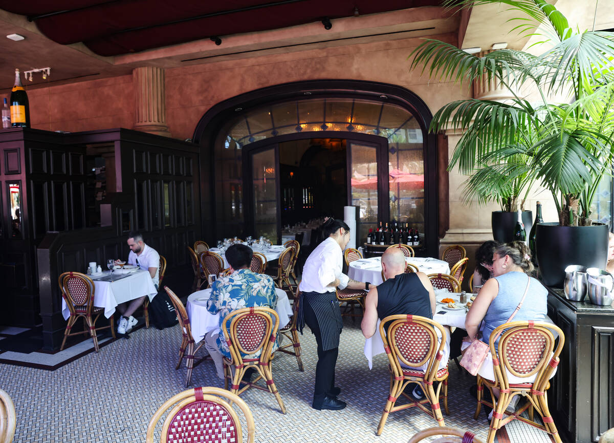 Guests dine in the pavilion at Mon Ami Gabi at Paris Las Vegas hotel-casino in Las Vegas, Tuesd ...