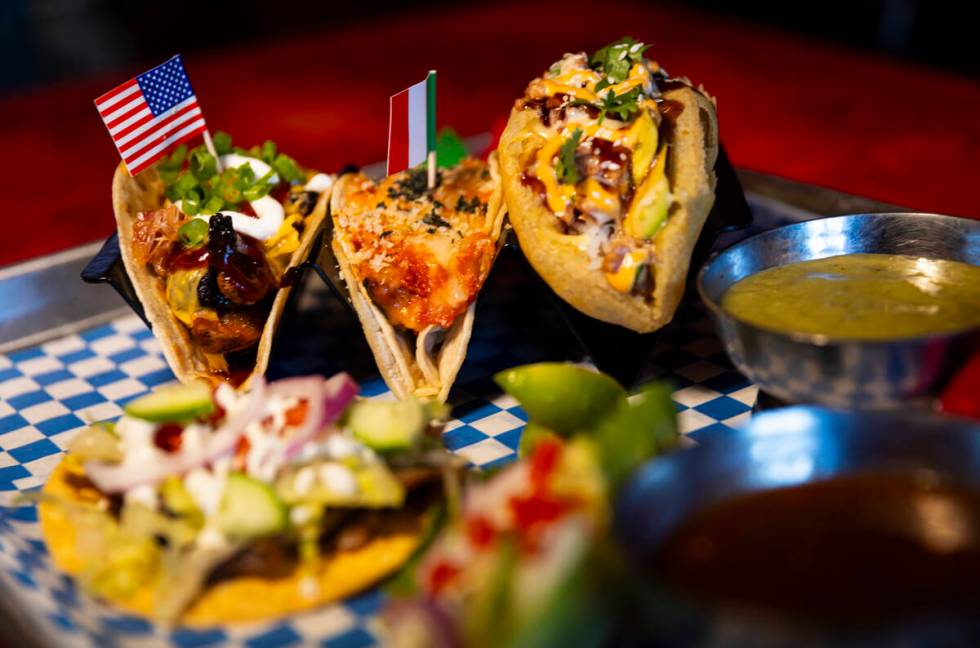 A plate of tacos with chips and salsa is seen at International Taco Co. on Wednesday, Aug. 14, ...