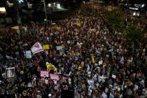 People protest against Israeli Prime Minister Benjamin Netanyahu's government and call for the ...