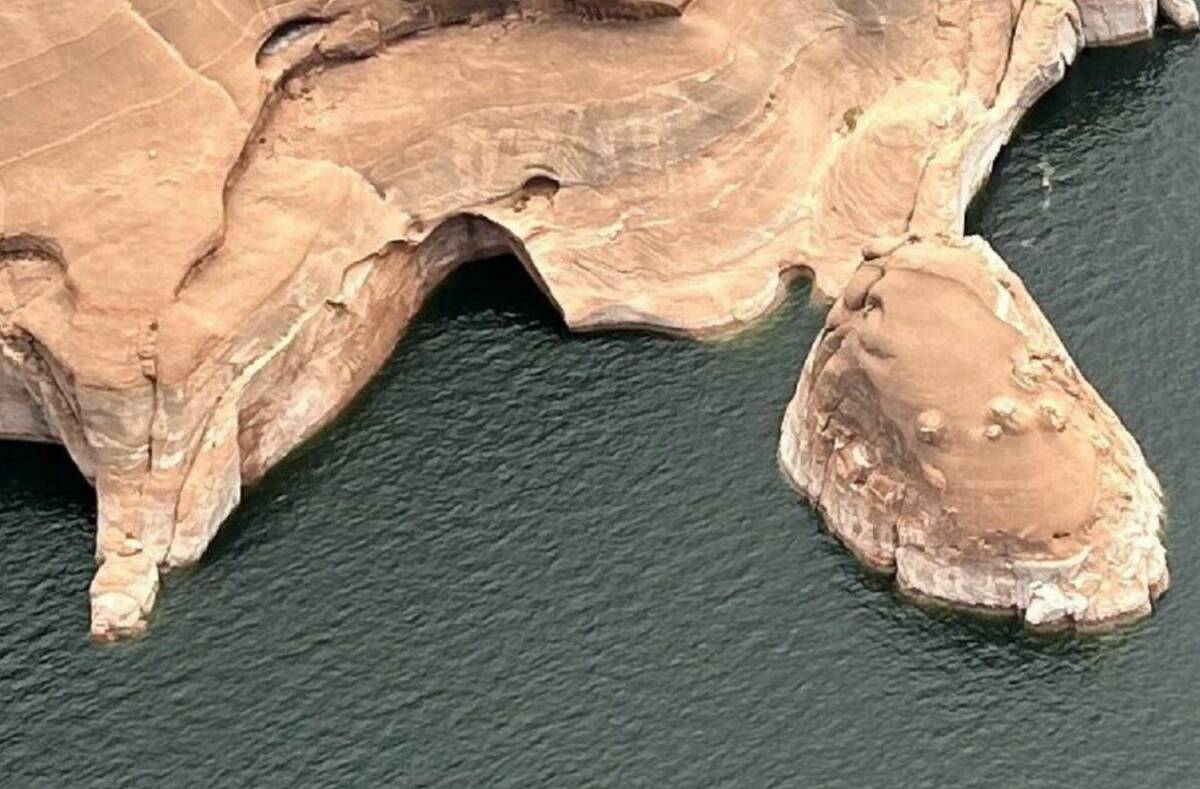 This photo shows the Double Arch, center, after the collapse, Friday, August 9th, 2024, in Rock ...