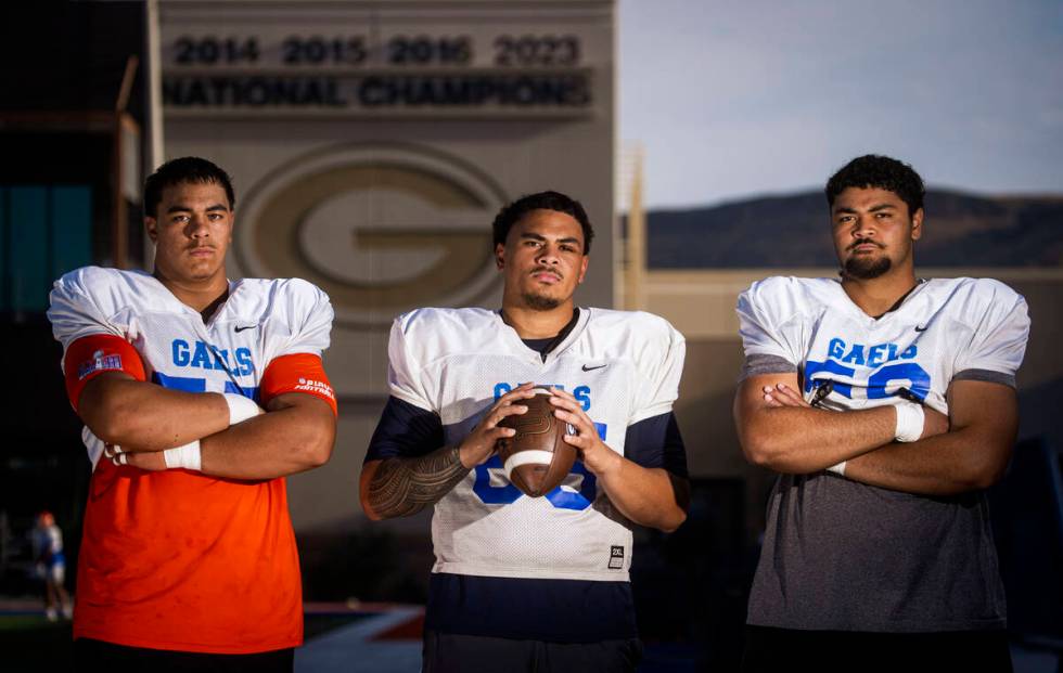 Bishop Gorman offensive linemen, from left, Alai Kalaniuvalu, Seuseu "SJ" Alofaituli, ...