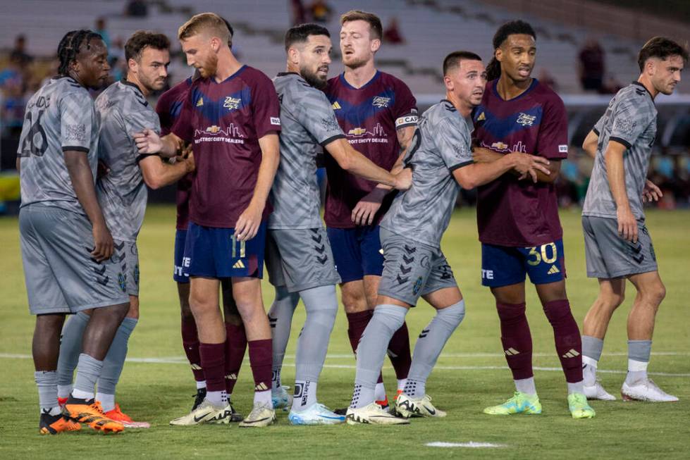 Members of the Las Vegas Lights FC and the Detroit City FC wait for a corner kick during a USL ...