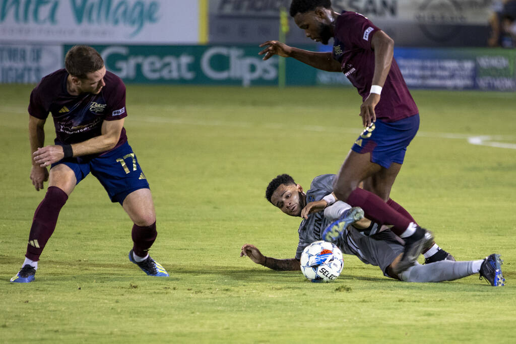 Las Vegas Lights FC defender Shawn Smart (20) slides for the ball during a USL Championship soc ...