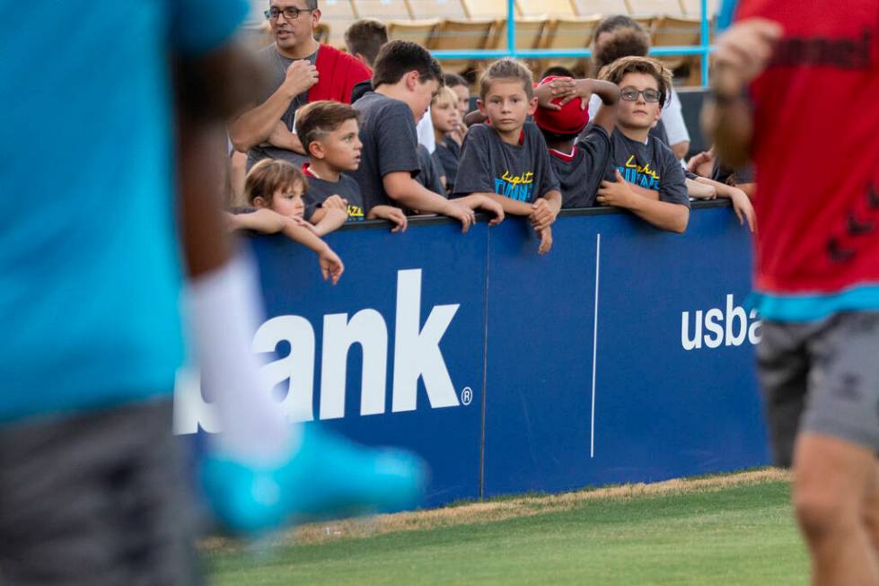 Young Las Vegas Lights FC fans watch the team warmup before a USL Championship soccer game agai ...