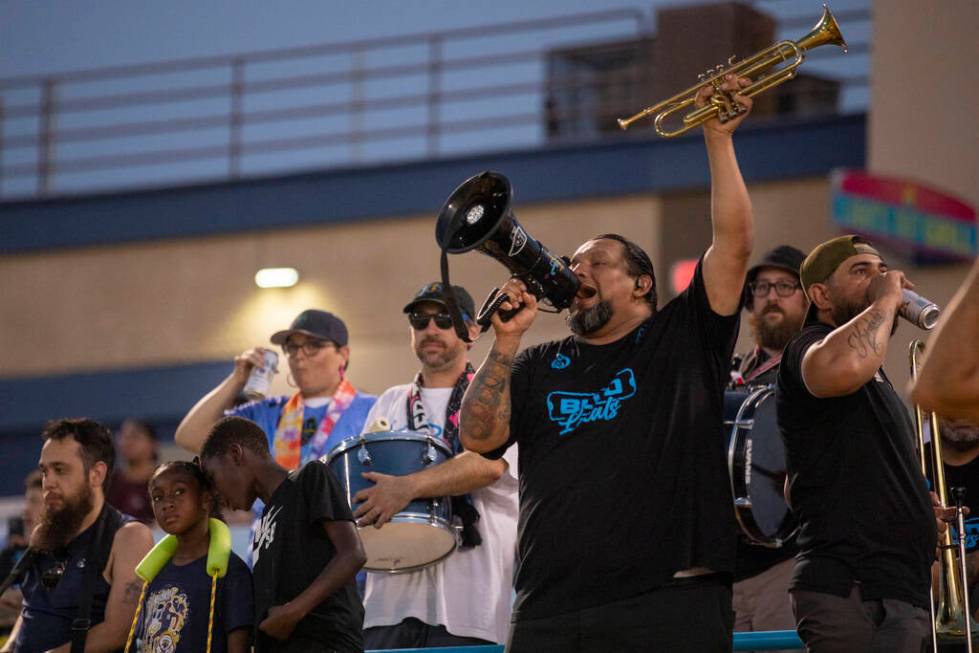 Las Vegas Lights FC fans chant and play instruments during a USL Championship soccer game again ...