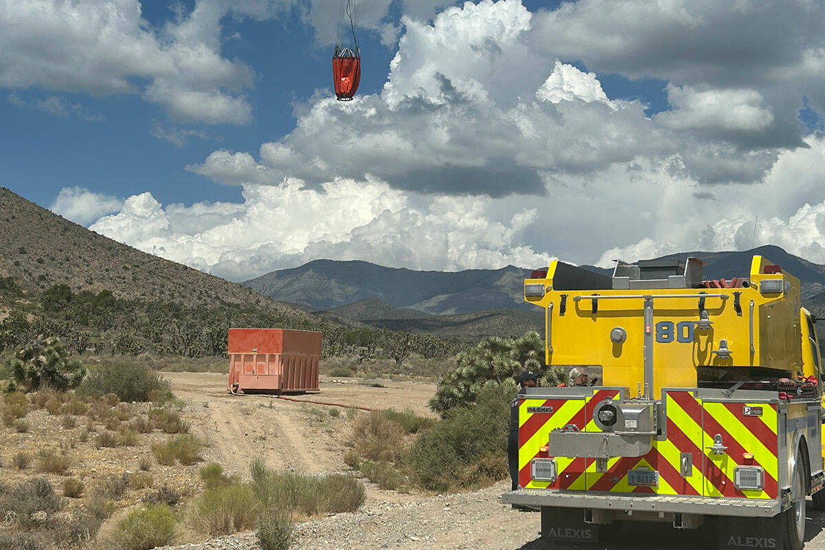 The Clark County Fire Department deploys water tenders to fight fires in the Spring Mountains. ...