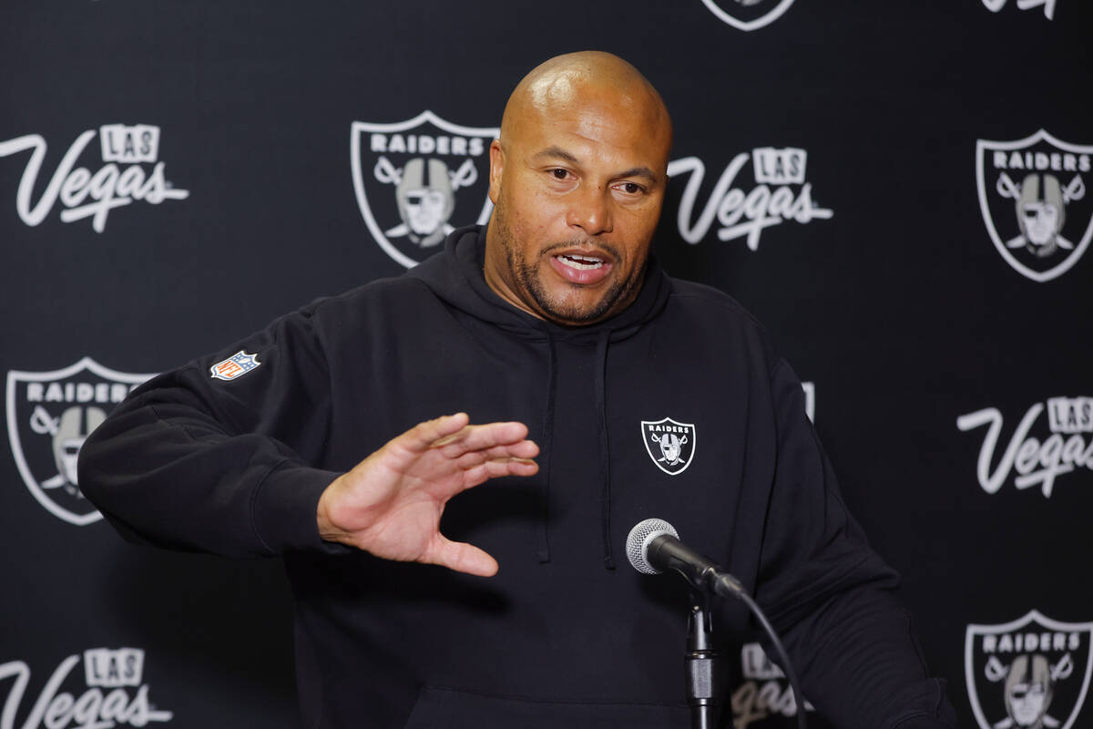 Las Vegas Raiders head coach Antonio Pierce talks to the media following an NFL football game a ...