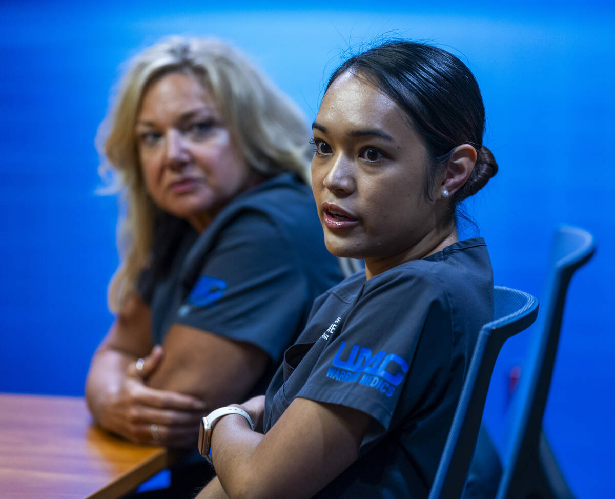 Staff Sgt. Ashley Byrd with Retired Chief Master Sgt. Nikki Owens, talks on her role as a respi ...