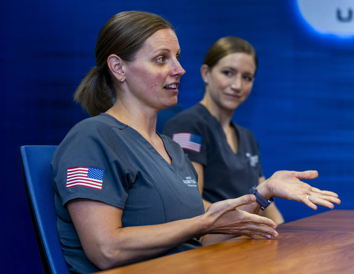 Lt. Col. Becky Bryant with Maj. Anna Prendergast, talks on her role as a ER nurse instructor du ...