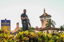 A Secret Service agent stands guard outside the Mar-a-Lago home of former US President Donald T ...