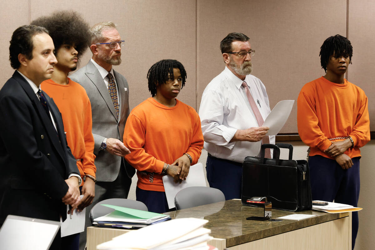 From left, Treavion Randolph, Gianni Robinson, and Dontral Beaver appear during a Juvenile Cour ...