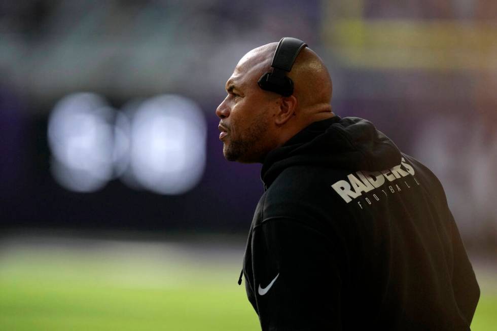 Las Vegas Raiders head coach Antonio Pierce watches from the sideline during the second half of ...