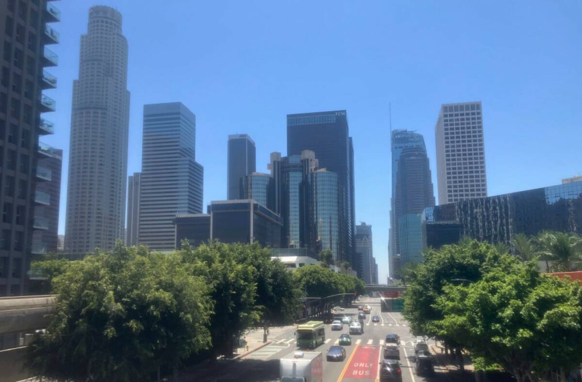 Traffic moves along in downtown Los Angeles on Monday, Aug. 12, 2024, after an earthquake struc ...