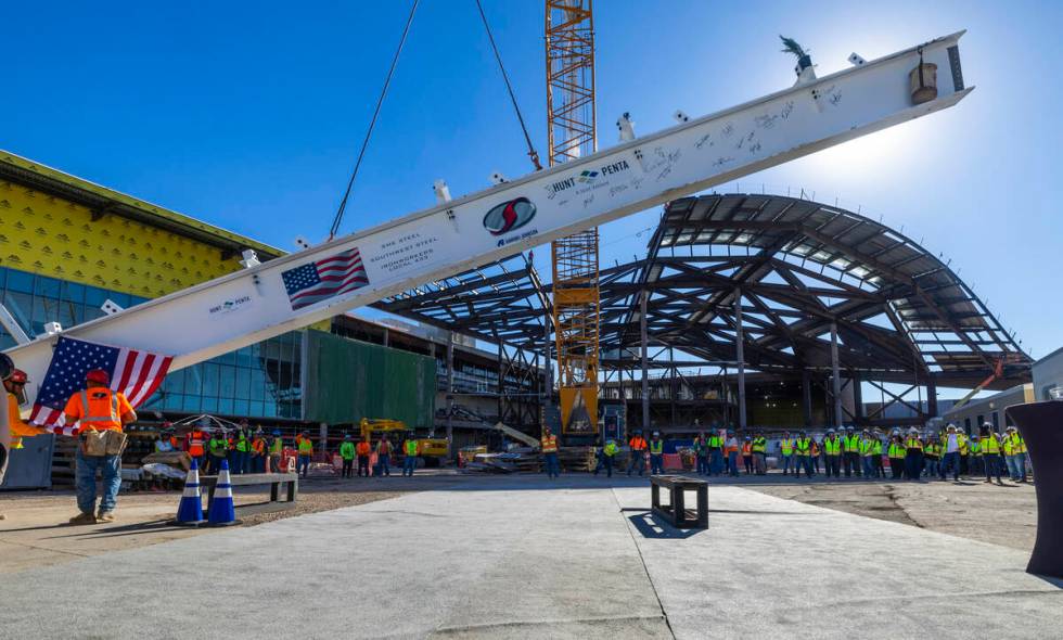 The final beam is raised as the Las Vegas Convention and Visitors Authority holds a topping-off ...