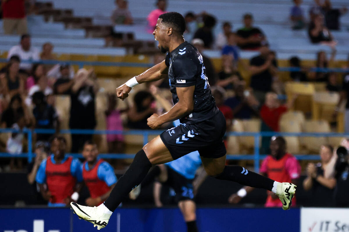 Las Vegas Lights FC forward Khori Bennett celebrates after scoring during a soccer match agains ...