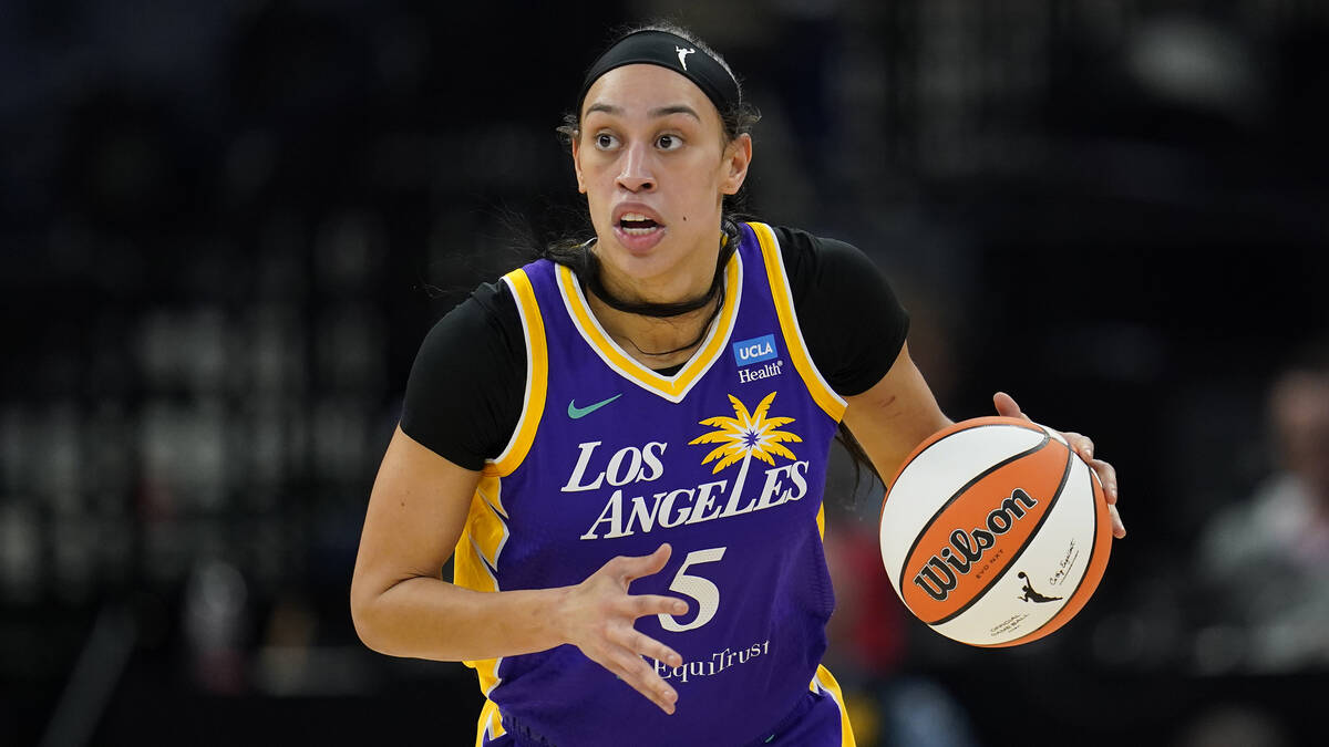 FILE - Los Angeles Sparks forward Dearica Hamby dribbles down the court during the first half o ...