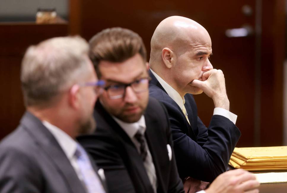 Robert Telles, right, waits for the jury in court with his attorneys Robert Draskovich, left, a ...