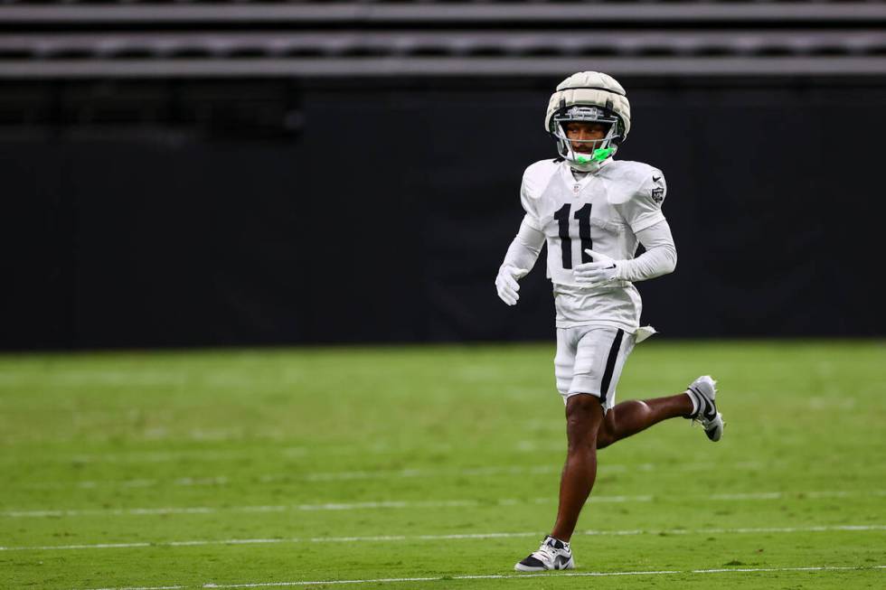 Raiders wide receiver Tre Tucker (11) runs on the field during an NFL football practice at Alle ...