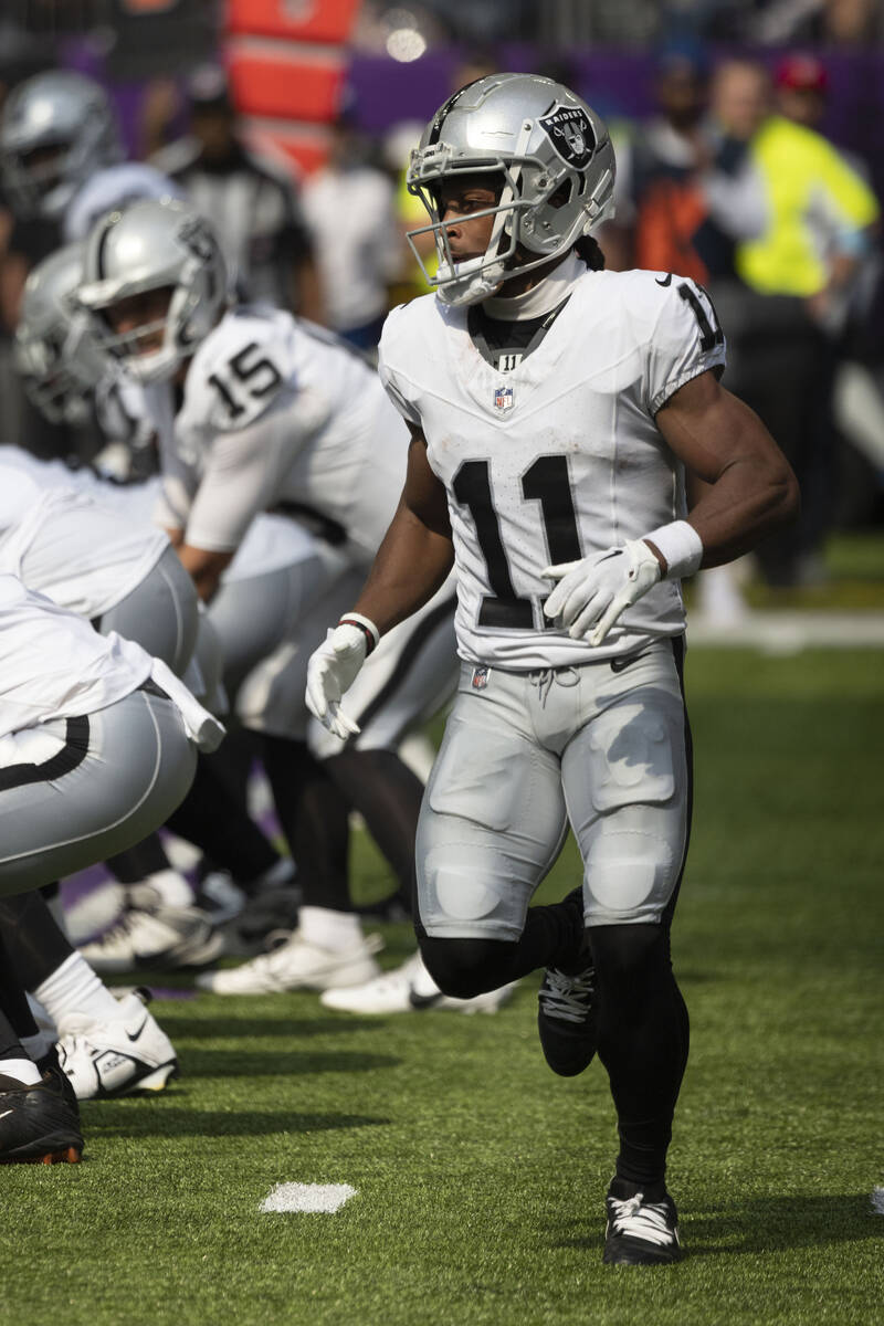 Las Vegas Raiders wide receiver Tre Tucker (11) runs during an NFL preseason football game agai ...