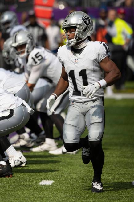 Las Vegas Raiders wide receiver Tre Tucker (11) runs during an NFL preseason football game agai ...