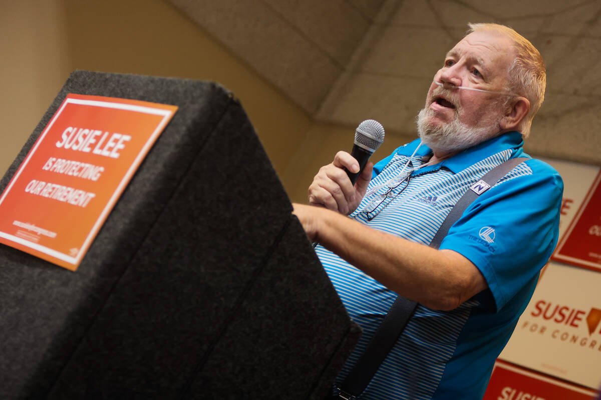 Steve Horner, a retired teacher, speaks during a small rally hosted by Rep. Susie Lee, D-Nev., ...