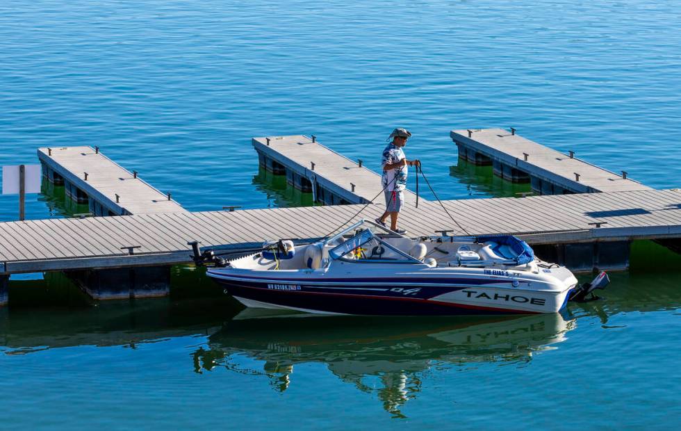 A boater waits to shove off after launching at the Callville Bay Marina on Lake Mead Thursday, ...